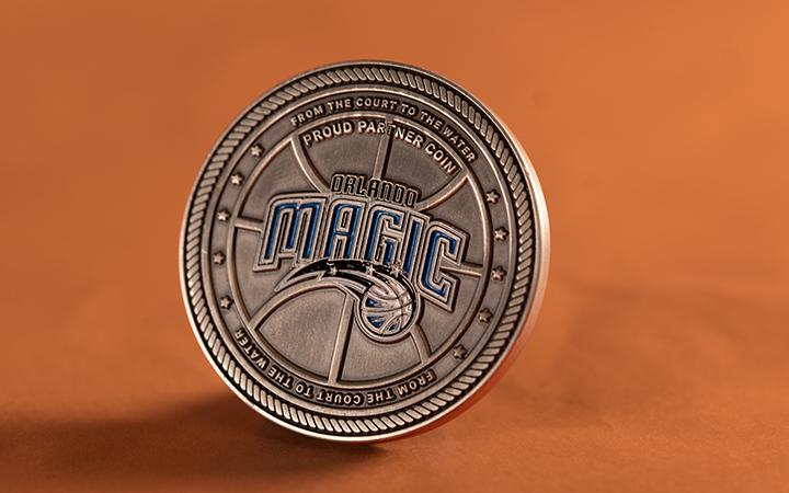 Celebrating Partnership: Action Water Sports & Orlando Magic Custom Challenge Coins